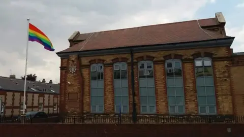 Twitter/@HP_BridDrifHorn Rainbow flag at Bridlington Police Station