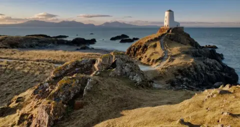 Mathew Browne A lighthouse on the coast 