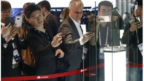 EPA Taking pictures of the new Huawei foldable phone