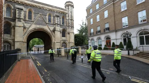 PA Media A police cordon near Forbury Gardens park in Reading