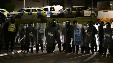 Getty Riot police in Ely, Cardiff, during the events of 22 May and 23 May, 2023