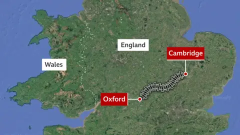 A graphic of a map of England and Wales which shows the locations of Oxford and Cambridge. Between the two are train tracks to illustrate the railway line between the two.