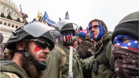 Getty Images Trump supporters prepare to storm Congress