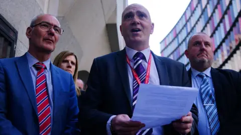 PA Media Former Assistant Chief Constable Paul Fullwood