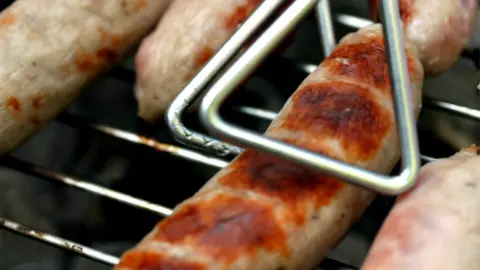 Sausages on a barbecue