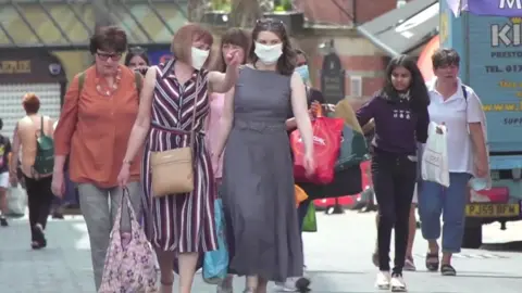 Shoppers in Preston