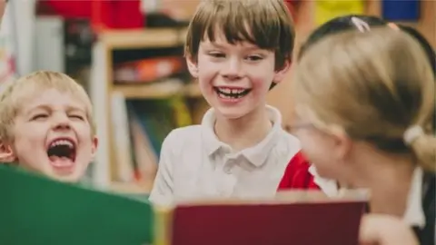 Getty Images children laugh