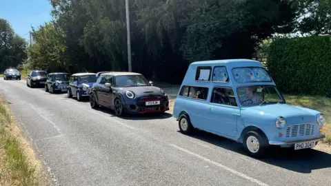 Robin Middleton A convoy of mini's led by Charlie's new mini van