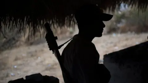 Getty Images File image policeman at a checkpoint in Apaxtla de Castrejon, Guerrero state, Mexico, on March 26, 2018