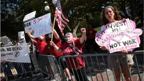 Getty Images Liberals protested outside of Congress on Thursday