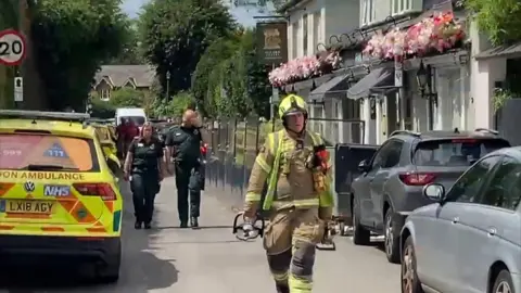 Emergency responders in Wimbledon.