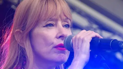 Suzanne Vega performing at the Cambridge Folk Festival