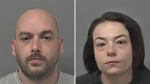 A two-way composite of two people in police mugshots. A bald man on the left has a brown beard and moustache and grey top on and a woman on the right has long brown hair.