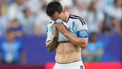 Lionel Messi is emotional after scoring Argentina's first goal against Algeria in their World Cup opener