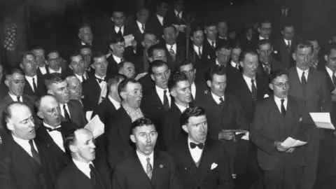 Getty Images The Pontardawe Male Voice Choir pictured rehearsing in 1937