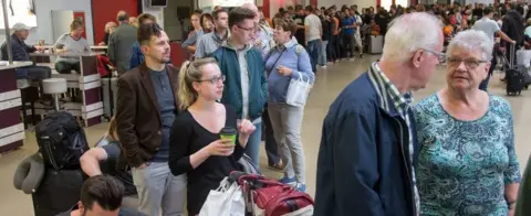 EPA Air Berlin flight cancellations mean big queues at Tegel airport on 12 Sept