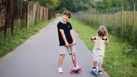 BOLDCUBE SCOOTERS children using scooters