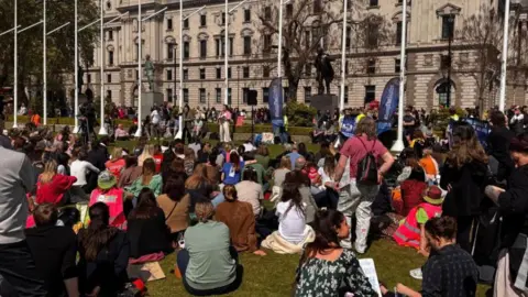 Karen Forsyth People gathered and sat together in Parliament Square petitioning for better eating disorder services