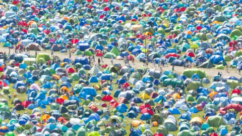 Getty Images An aerial view of tents in fields at Reading Festival.