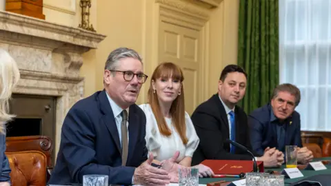 Ian Vogler/Daily Mirror/PA Wire Prime Minister Sir Keir Starmer (left) and Deputy Prime Minister Angela Rayner during a meeting with English regional mayors, Ben Houchen Mayor of the Tees Valley and Steve Rotheram (right) Mayor of the Liverpool City Region, at No 10 Downing Street in Westminster.