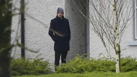 PA Media Enoch Burke standing outside Wilson's Hospital School in County Westmeath