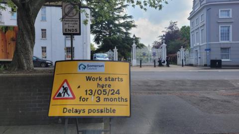 Work sign in front of Vivary Park in Taunton