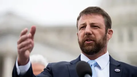 Getty Images Markwayne Mullin speaks during the news conference on the Invest to Protect Act outside the Capitol on Thursday, 12 May 2022