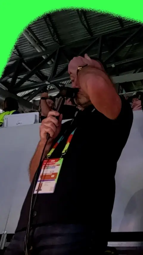 Alan Shearer with his head in his hand as he reacts to Argentina's winning goal against England