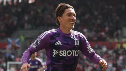 Harry Wilson celebrates scoring for Fulham last season 