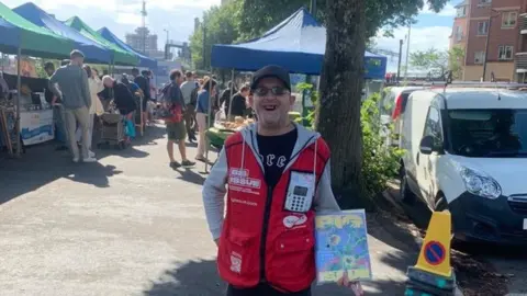 Stuart Drucker at Cardiff riverside market selling the Big Issue