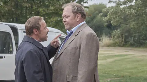 ITV Stephen Graham and Mark Addy in White House Farm