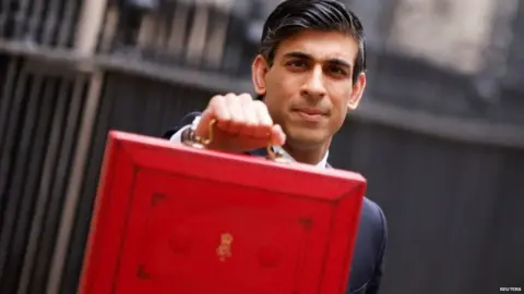 Reuters Rishi Sunak outside 11 Downing Street with red budget box