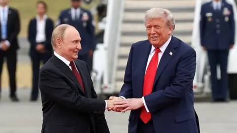 President Donald Trump meets his Russian counterpart, Vladimir Putin on the tarmac.