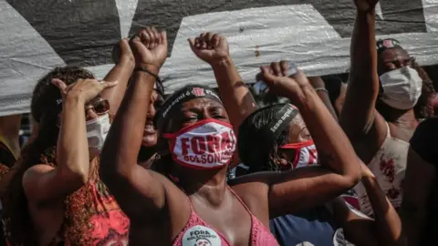 EPA A protest against Jair Bolsonaro in Rio, Brazil, 29 May 2021