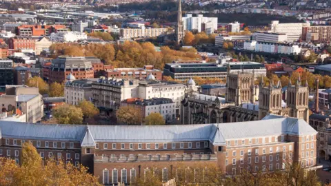 Getty Images City Hall in Bristol in the foreground with the city and other buildings in the background