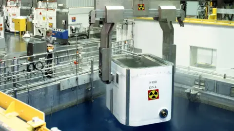 Getty Images A worker inside the nuclear processing plant at Sellafield