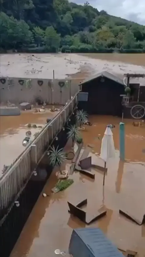 Flood water in back garden.