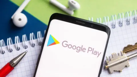 Getty Images Google Play logo in phone