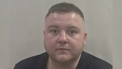 Humberside Police Sean Gleeson has been jailed for 18 months for assaulting a football fan