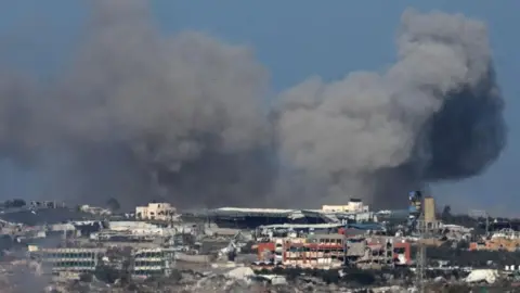 EPA-EFE/REX/Shuterstock Israeli strikes on the Gaza Strip