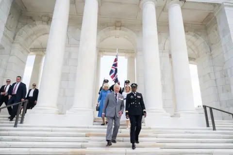 Getty Images King Charles III and Queen Camilla, escorted by US Army Maj. Gen. Antoinette Gant (R) and White House Chief of Protocol Monica Crowley, tour the Memorial Amphitheater at Arlington National Cemetery on April 30, 2026, in Arlington, Virginia. 