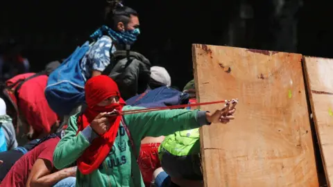 Reuters Demonstrators clash with police in Buenos Aires - 18 December