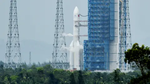 The combination of the Chang'e-6 lunar probe and the Long March-5 Y8 carrier rocket is seen at the launching area of the Wenchang Space Launch Center on May 3, 2024 in Wenchang, Hainan Province of China