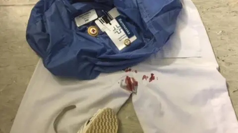 Petra Vinberg Linder/Facebook Blood stained scrubs