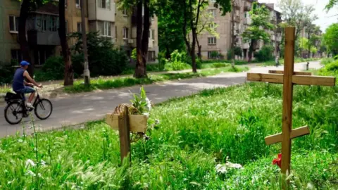 Getty Images Graves in a residential