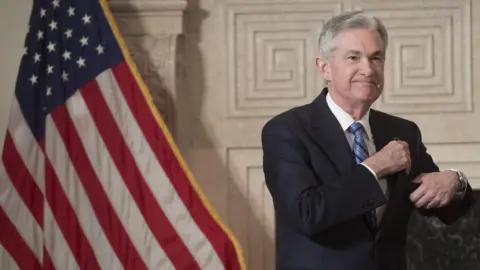 AFP/Getty Jerome Powell arrives to takes the oath of office as he is sworn-in as the new Chairman of the Federal Reserve (FED) at the Federal Reserve Building in Washington, DC, February 5, 2018.