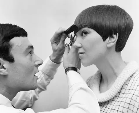 Mirrorpix Fashion designer Mary Quant seen here having the finishing touches made to her new hairstyle by Vidal Sassoon 12th November 1964