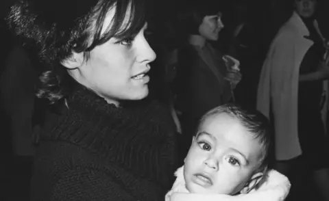 REPORTERS ASSOCIES/Gamma-Rapho Nathalie Delon with son Anthony in 1965