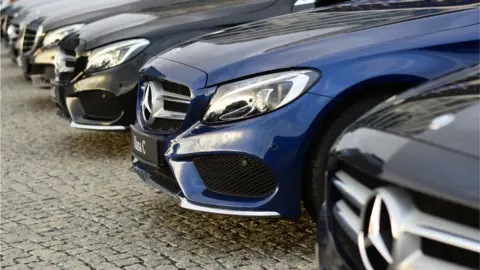 Getty Images A row of Mercedes Benz cars