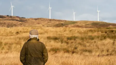 Getty Images Wind turbines